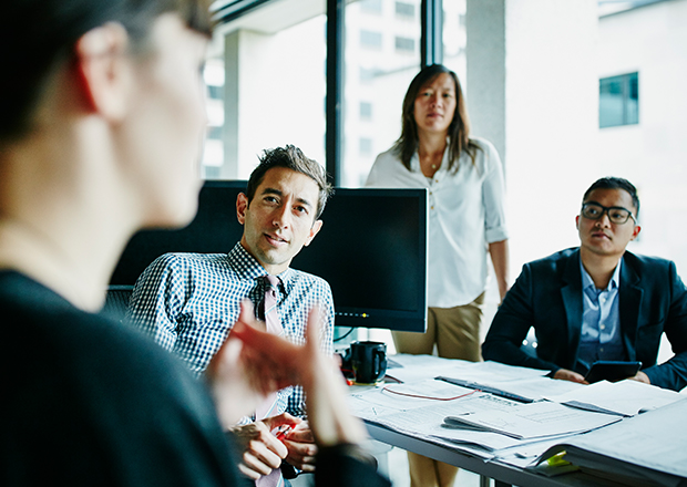 Group speaking around a table